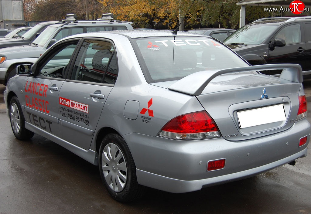 4 249 р. Накладка заднего бампера GT Dynamics Mitsubishi Lancer 9 1-ый рестайлинг седан (2003-2005) (Неокрашенная)  с доставкой в г. Тамбов