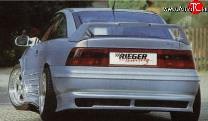 4 499 р. Накладка заднего бампера Rieger Opel Calibra A (1990-1997)  с доставкой в г. Тамбов