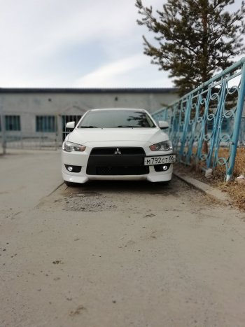 3 099 р. Клыки Evo на передний бампер автомобиля  Mitsubishi Lancer  10 (2007-2017) седан дорестайлинг, хэтчбэк дорестайлинг, седан рестайлинг, хэтчбек 5 дв рестайлинг (Неокрашенные)  с доставкой в г. Тамбов. Увеличить фотографию 7