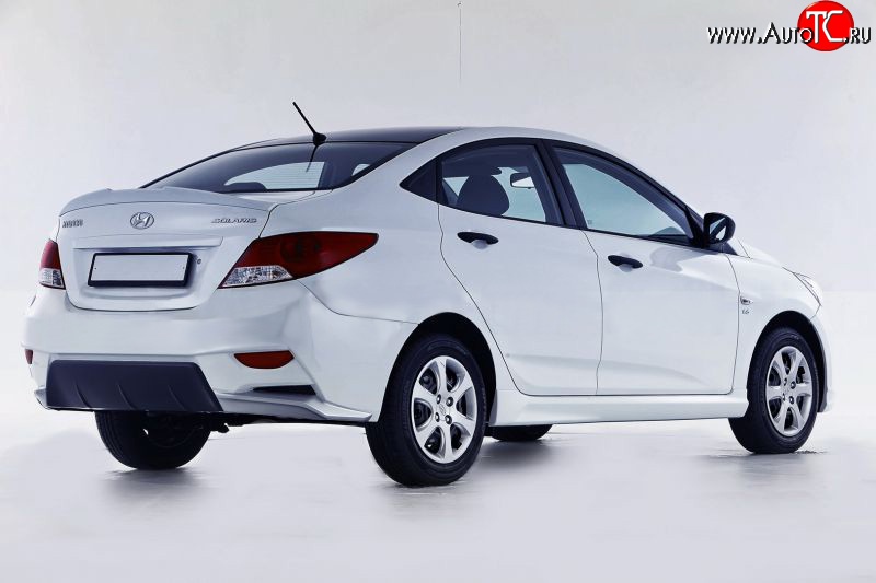 14 499 р. Задний бампер Sport  Hyundai Solaris  RBr (2010-2014) седан дорестайлинг (Неокрашенный)  с доставкой в г. Тамбов