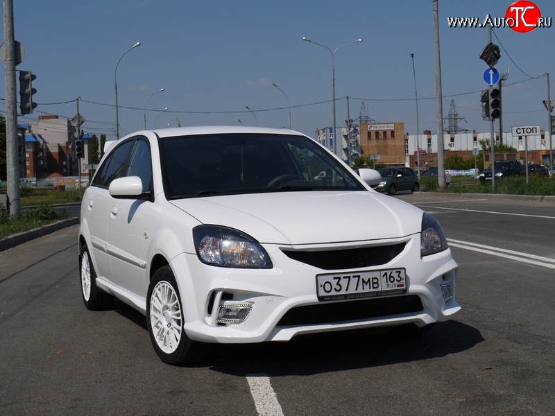 10 999 р. Передний бампер Vita Dm  KIA Rio ( 2 JB,  4 FB) (2005-2024) дорестайлинг седан, дорестайлинг, хэтчбэк 5 дв., рестайлинг, хэтчбэк 5 дв., рестайлинг седан (Без сетки, Неокрашенный)  с доставкой в г. Тамбов