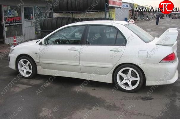 6 699 р. Пороги накладки EVO 9  Mitsubishi Lancer  9 (2003-2009) 1-ый рестайлинг седан, 1-ый рестайлинг универсал, 2-ой рестайлинг седан, 2-ой рестайлинг универсал (Неокрашенные)  с доставкой в г. Тамбов