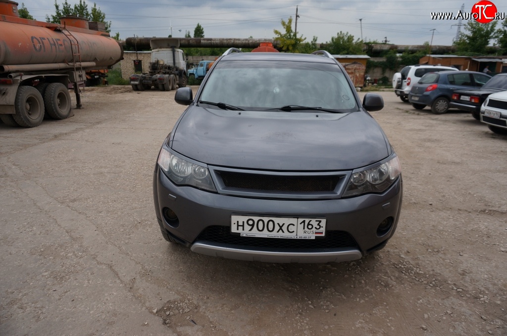 5 449 р. Решётка радиатора (рестайлинг) Sport Mitsubishi Outlander XL (CW)  рестайлинг (2010-2013) (Неокрашенная)  с доставкой в г. Тамбов