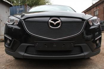 799 р. Зимняя заглушка решетки радиатора (с парктроником) PREMIUM Стрелка11 Mazda CX-5 KE дорестайлинг (2011-2014) (черная)  с доставкой в г. Тамбов. Увеличить фотографию 2